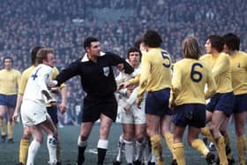 Bill Hirst took this photograph at Elland Road on March 18 1972 of referee Jack Taylor stepping in between  Billy Bremner and Tottenham Hotspur players during a sixth round  F A Cup tie, which Leeds won 2-1.