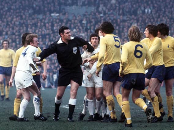 Bill Hirst took this photograph at Elland Road on March 18 1972 of referee Jack Taylor stepping in between  Billy Bremner and Tottenham Hotspur players during a sixth round  F A Cup tie, which Leeds won 2-1.