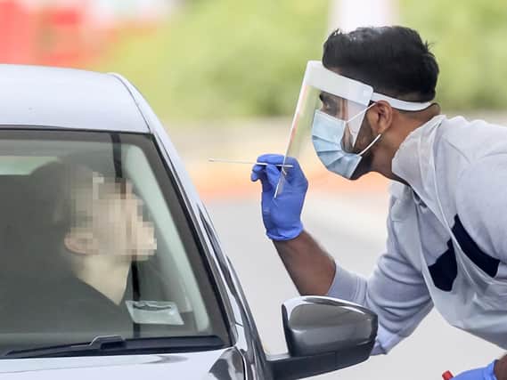 A person is tested for coronavirus at a site in Leeds (Photo: Danny Lawson/PA Wire)