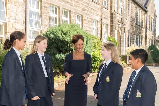 Janet Sheriff with pupils at Prince Henry's Grammar School in Otley.
