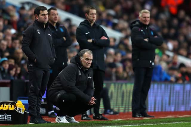 EVENTFUL: Marcelo Bielsa, second left, and Dean Smith, right, look on during Leeds United's 3-2 success at Villa Park of December 2018. Photo by Catherine Ivill/Getty Images.