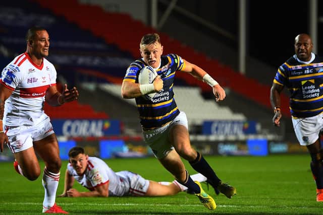 Harry Newman on the attack for Rhinos in last year's Cup win over Hull KR. Picture by Jonathan Gawthorpe.