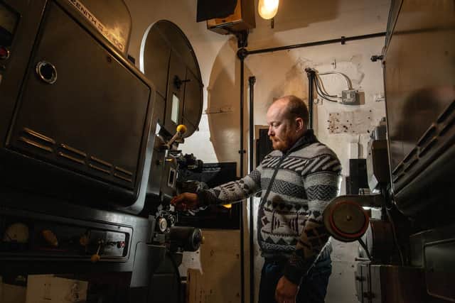 Hyde Park Picture House Projection Manager Mike Sharples checking the 35mm projectors. Picture Bruce Rollinson
