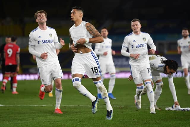 CLASSY: Modern-day star Raphinha, second left, celebrates his strike in Leeds United's 3-0 victory at home to Southampton as Patrick Bamford, left, beams from ear to ear. Photo by Gareth Copley/Getty Images.