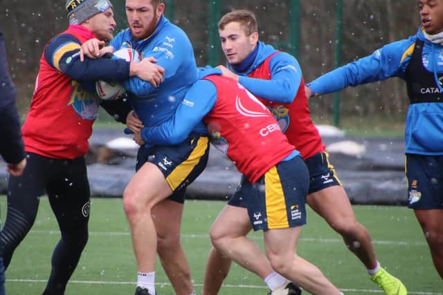 Young players like Cameron Smith, with ball, make Kevin Sinfield excited for Rhinos' future. Picture by Phil Daly/Leeds Rhinos.