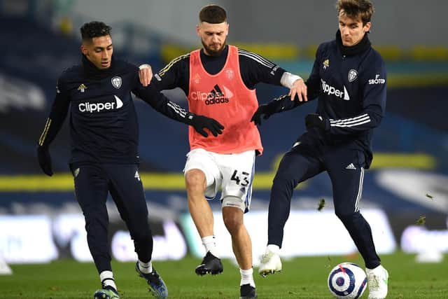 'UNBELIEVABLE TEKKERS': Leeds United winger Raphinha, left, pictured in the warm-up before Tuesday night's clash at home to Southampton with Mateusz Klich, centre, and Diego Llorente, right. Photo by Gareth Copley/Getty Images.