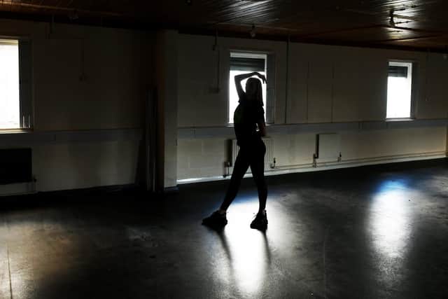 Kaci Emmonds, young dance leader, in the dance studio being refurbished at the Dazl  Dance Centre at Middleton Community Centre in Leeds.