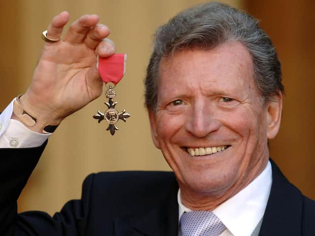 Johnny Briggs pictured after collecting an MBE from Queen Elizabeth II at Buckingham Palace in March 2007. PIC: PA