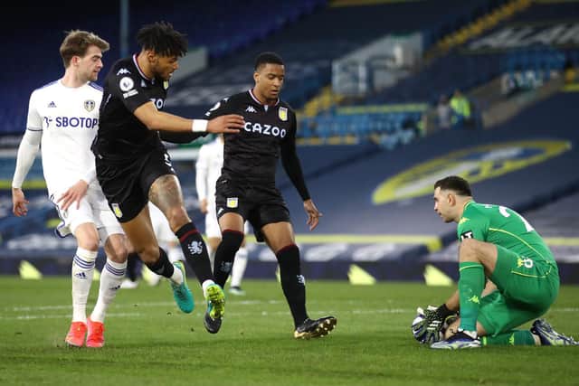 CLEAN SHEET: Aston Villa's England international centre-back Tyrone Mings, second left, helps keep out Whites striker Patrick Bamford, left, in Saturday's 1-0 victory at Elland Road. Photo by Tim Goode - Pool/Getty Images.