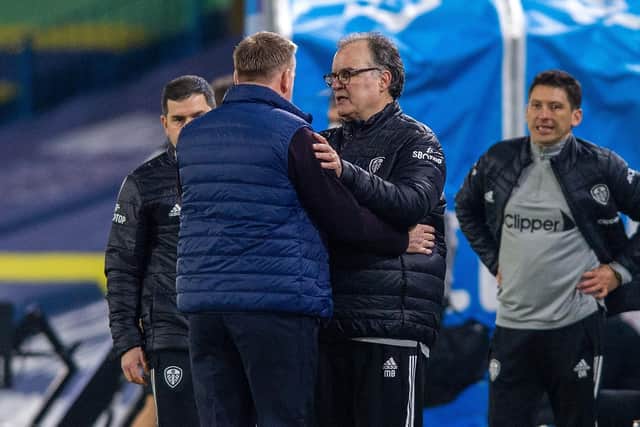Marcelo Bielsa and Dean Smith embrace at full time. Picture: Bruce Rollinson.