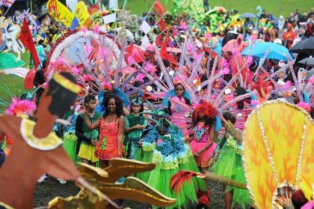 A sea of colour as performers prepare for the The 45th Leeds West Indian Carnival in August 2012.