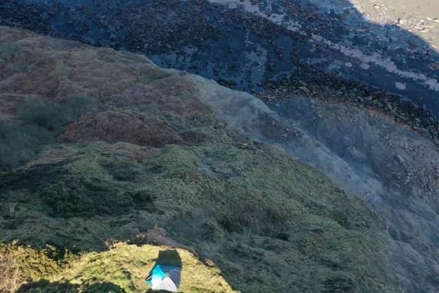 Emergency service personnel found the family in a tent around six feet from the edge of a sheer precipice.