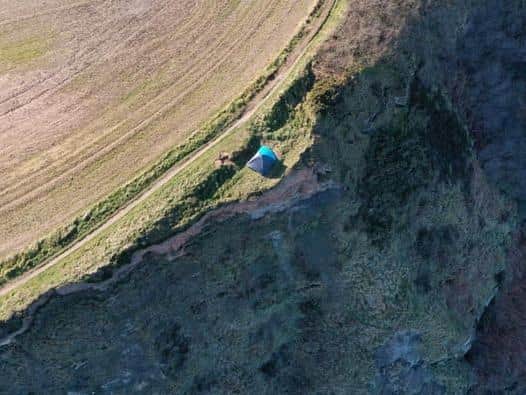 Coastguard rescue officers from Staithes and Whitby attended and gave the couple "safety advice due to the dangerous location of their tent".