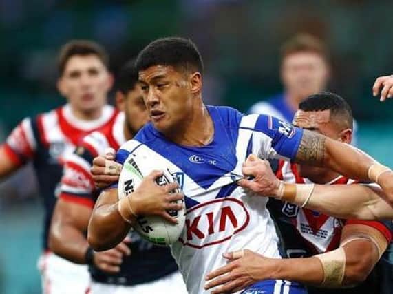 Nu Brown, with ball, playing for Canterbury Bulldogs against Sydney Roosters in 2019. Picture by  Ryan Pierse/Getty Images.