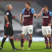 Premier League referee Mike Dean sends off West Ham defender Tomas Soucek. Pic: Getty