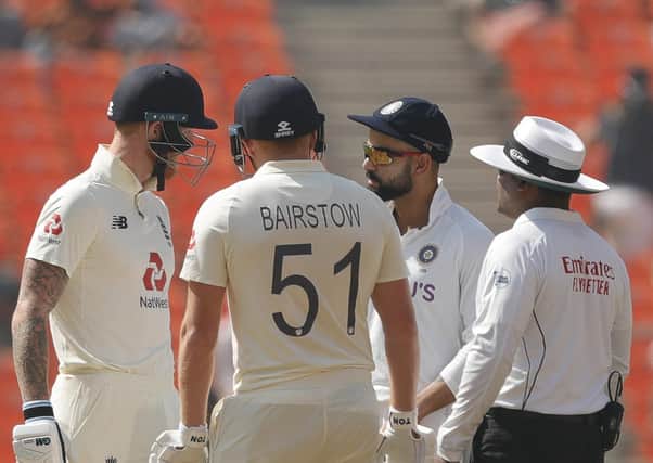 FLASHPOINT: England's Ben Stokes, left, and India captain Virat Kohli, second right, exchange words in the middle during day one in Ahmedabad. Picture: Saikat Das / Sportzpics for BCCI (via ECB).