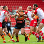 Liam Watts battles the St Helens defence. Picture by Jonathan Gawthorpe.