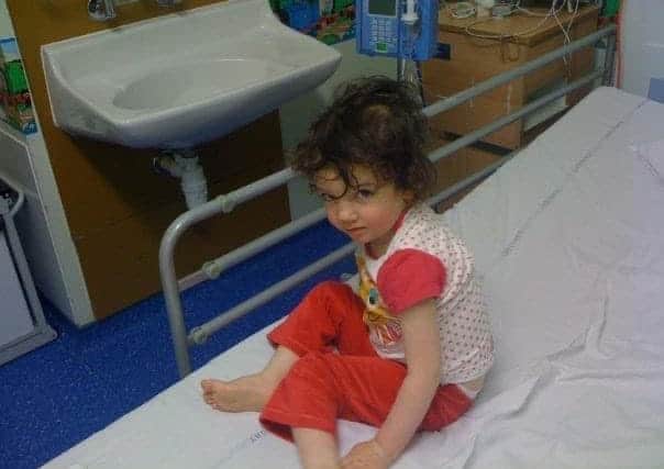 Lizzie as a toddler during one her regular visits to Leeds Children's Hospital.