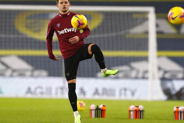 BRAZILIAN BATTLE: For West Ham full-back Aaron Cresswell, pictured warming up before December's Premier League clash facing Leeds United and Raphinha at Elland Road. Photo by JASON CAIRNDUFF/POOL/AFP via Getty Images.