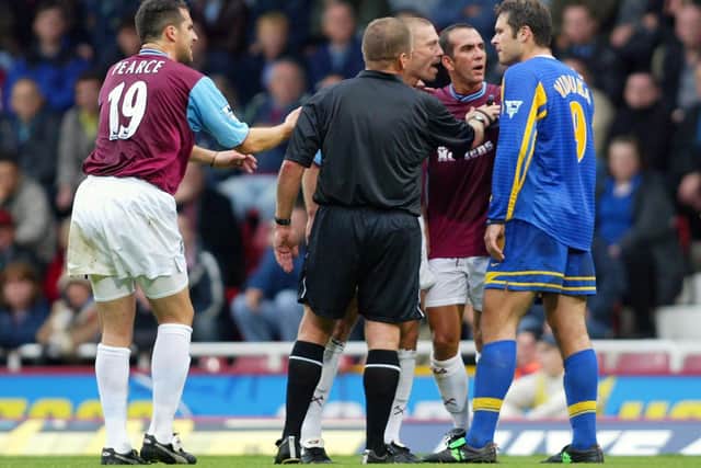 HEATED: Leeds United striker Mark Viduka, right, argues with West Ham's Tomas Repka, third from left, as Ian Pearce and Paolo Di Canio also become involved in the seven-goal epic of November 2003. Photo By Ben Radford/Getty Images.