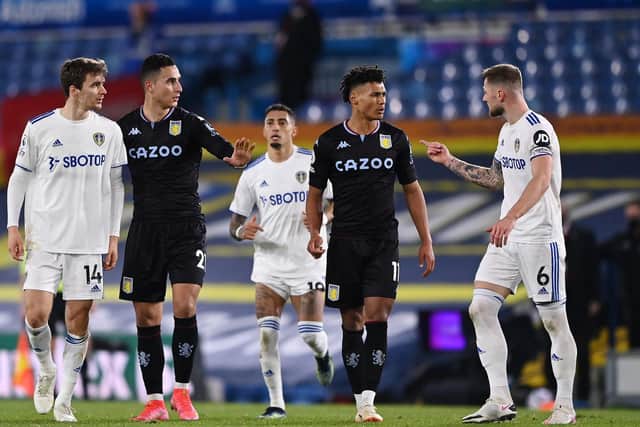NEEDLE: Between Leeds United and Aston Villa in last weekend's Premier League clash at Elland Road as Liam Cooper, right, locks horns with Ollie Watkins who clashed with Diego Llorente, left. Photo by Laurence Griffiths/Getty Images.