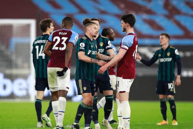 WINNING UGLY: West Ham captain Declan Rice with Leeds United's fellow England international midfielder Kalvin Phillips after Monday's Premier League clash at the London Stadium. Photo by Ian Walton - Pool/Getty Images.