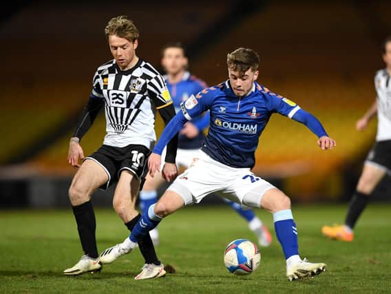LEARNING LESSONS - Leeds United youngster Alfie McCalmont says he's learning how to take care of himself in physical games on loan at League Two Oldham Athletic. Pic: Getty