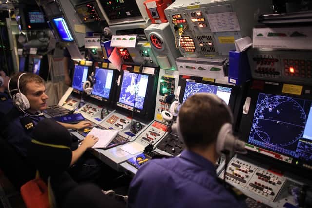 AT SEA: Sailors work in the operations room of HMS Ark Royal during Exercise Auriga on July 14, 2010 at sea in Onslow Bay near North Carolina. (Photo by Christopher Furlong/Getty Images)