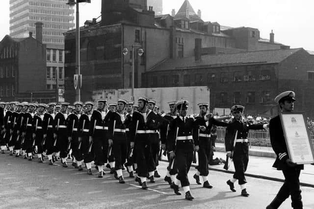 Leeds: 25th October 1973. Queen Elizabeth the Queen Mother granted the Freedom of the City to HMS Ark Royal. Four hundred of the ships company took part in a march past from the Civic Hall through the City Centre, bearing the charter. Cookridge Street is in the background. Yorkshire Post images.