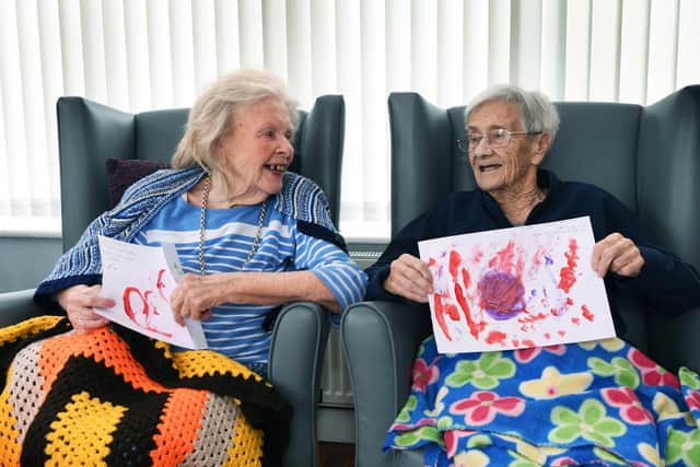Residents at Moorleigh Nursing Home in Kippax with drawings by children at Little Learners Nursery.
Picture : Jonathan Gawthorpe