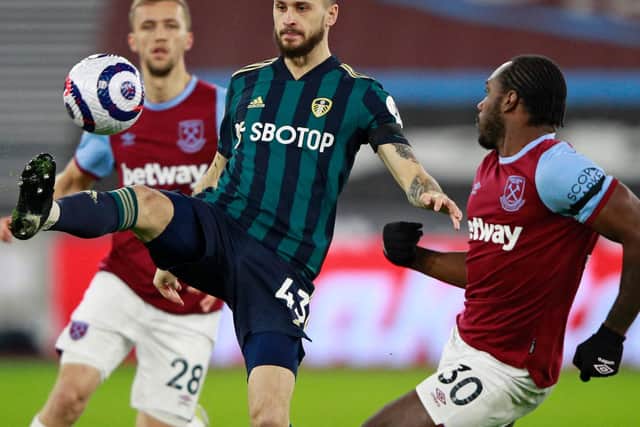 BUSY: Leeds United's Polish international midfielder Mateusz Klich during Monday night's 2-0 reverse at West Ham. Photo by IAN WALTON/POOL/AFP via Getty Images.
