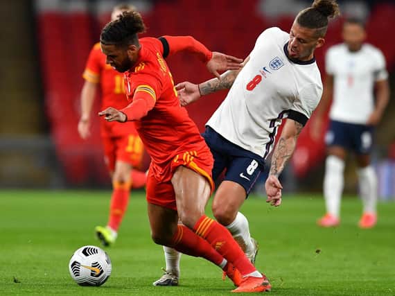 FRIENDLY FIRE - Tyler Roberts came up against Leeds United team-mate Kalvin Phillips when Wales met England. Roberts has been called up again. Pic: Getty