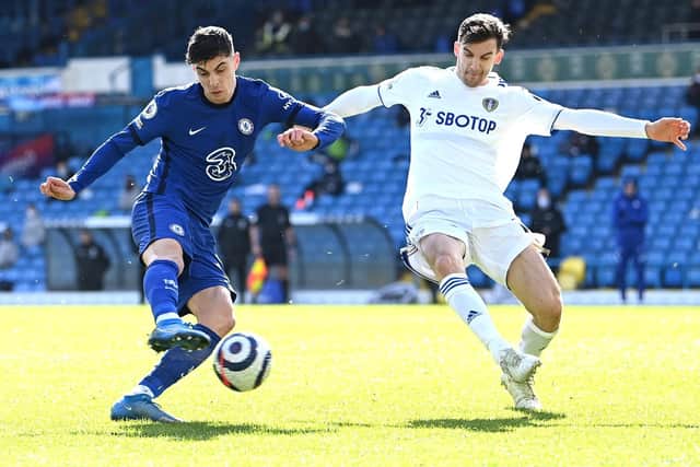 KEPT OUT: Chelsea forward Kai Havertz, left, pictured being closed down by Leeds United's Diego Llorente in Saturday's goalless draw at Elland Road. Photo by Laurence Griffiths/Getty Images.