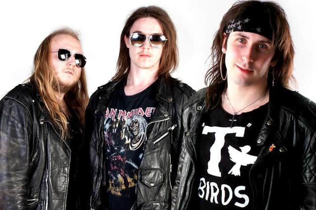 The band members - cousins Stel Robinson and T-Bone, along with childhood friend, Goose