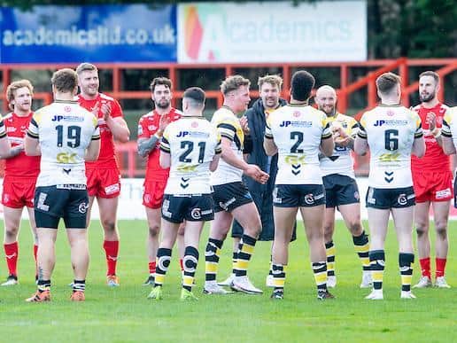 Adam Milner is given a guard of honour by both sides after his testimonial game. Picture by Allan McKenzie/SWpix.com.