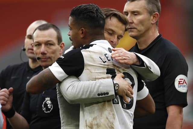 UPSETTING THE ODDS: Mario Lemina is embraced by Fulham manager Scott Parker after his winning goal at Anfield. Picture: Phil Noble/PA Wire.