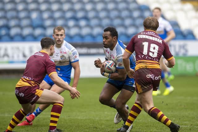 King Vuniyayawa in action for Rhinos in the pre-season game at Huddersfield. Picture by Tony Johnson.