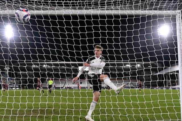 FRUSTRATION: Fulham defender Joachim Andersen blasts the ball into the net after Raphinha's Leeds United winner in Friday night's clash at Craven Cottage. Photo by Justin Setterfield/Getty Images.