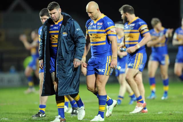 EDGED OUT: Brett Delaney and Carl Ablett show their disappointment after losing the opening game of the season against Warrington in 2016.  Picture: Tony Johnson.