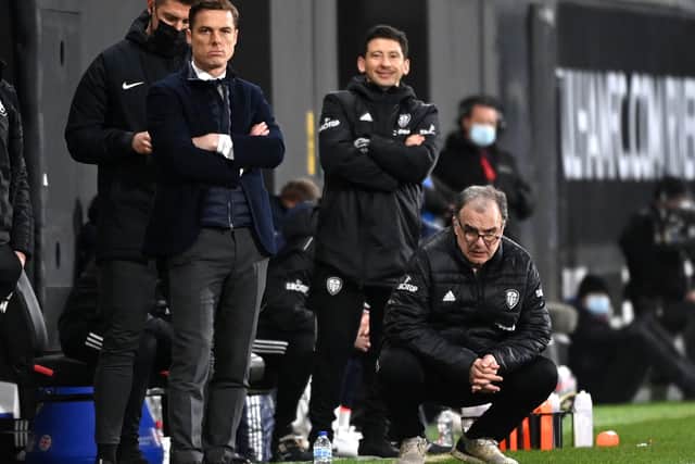 WATCHING BRIEF: Fulham manager Scott Parker (left) and Leeds United head coach Marcelo Bielsa on the sidelines at Fulham. Picture: Andy Rain/PA Wire.