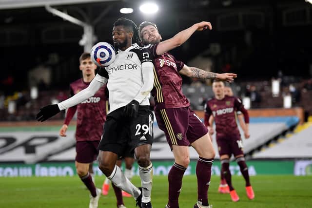 BATTLE: Fulham's Andre-Frank Zambo Anguissa and Leeds United's Stuart Dallas battle for the ball. Picture: Justin Setterfield/PA Wire.
