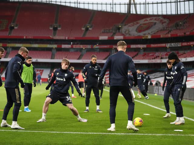 Leeds United youngster Joe Gelhardt warms up ahead of the Whites game at Arsenal. Pic: Getty