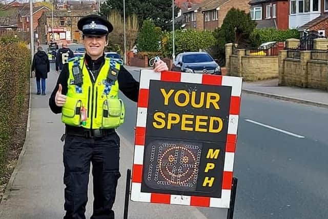 An officer from Leeds South NPT with the speed awareness device (Photo: WYP)