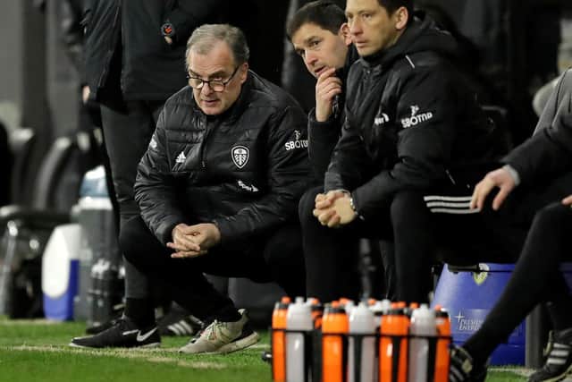 CAUTION: From Leeds United head coach Marcelo Bielsa, left, pictured during Friday night's 2-1 victory at Fulham which put the Whites on to 39 points for the Premier League campaign. Photo by MATT DUNHAM/POOL/AFP via Getty Images.