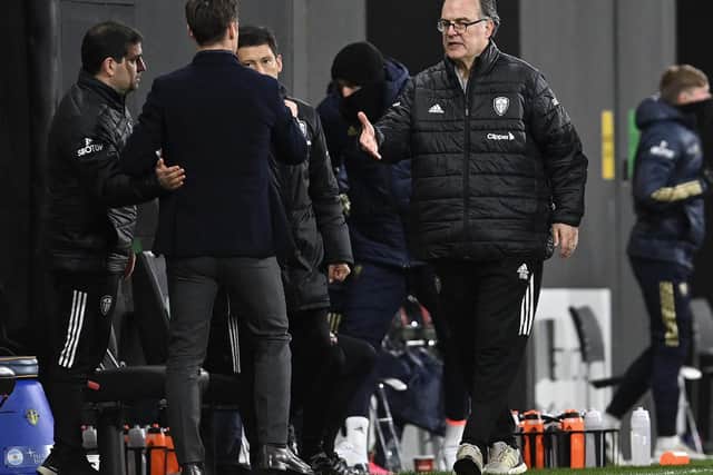 CAPITAL GAIN: Marcelo Bielsa, right, heads towards Fulham boss Scott Parker after Friday night's 2-1 triumph at Fulham brought his win in London as Leeds United head coach. Photo by Justin Setterfield/Getty Images.
