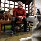 Vic Ferguson pictured with his dogs Mishka and Amber.

Picture by Simon Hulme