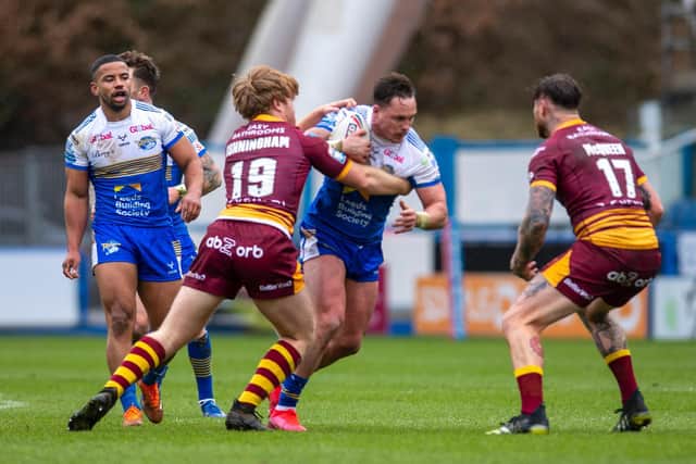 James Donaldson in possession for Rhinos in this month's pre-season game at Huddersfield. Picture by Tony Johnson.
