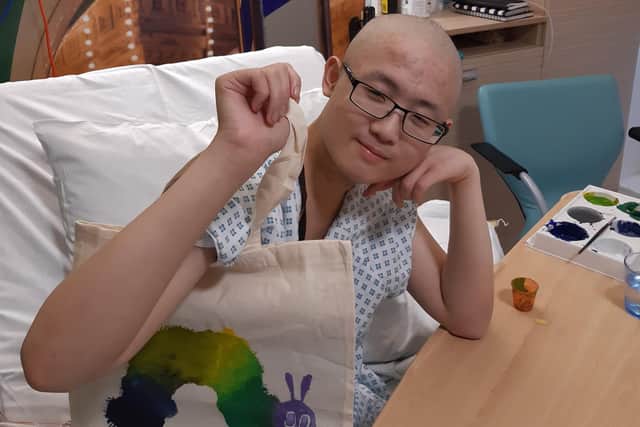 Michael Vu, 17, one of the patients involved in the project at Leeds Children's Hospital. Pictured with a story sack he stencilled.