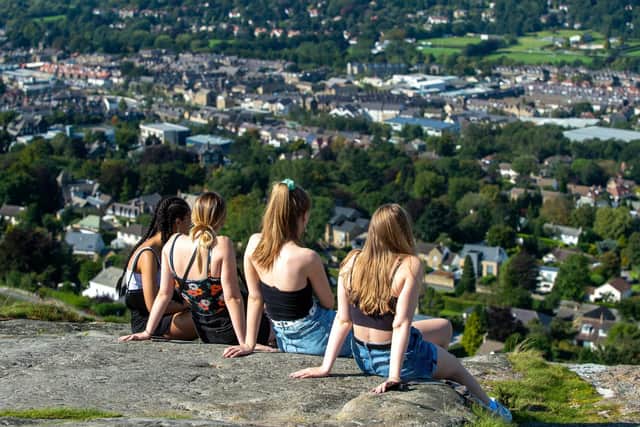 Young girls enjoying the view over Ilkley.