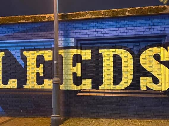 Landmarks in Leeds lit up on Tuesday to mark the National Day of Reflection (photo: Rob Wilson)